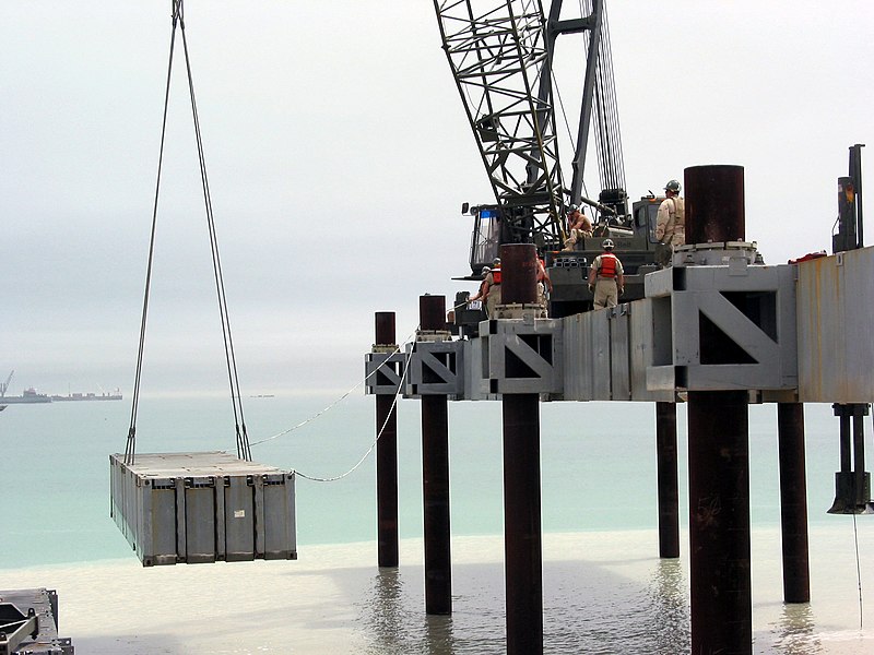 File:US Navy 030404-N-1050K-020 U.S. Navy Seabees assigned to Amphibious Construction Battalions (ACB) One and Two lift the next roadway section to be used in the building of the Elevated Causeway System-Modular (ELCAS (M)) structur.jpg