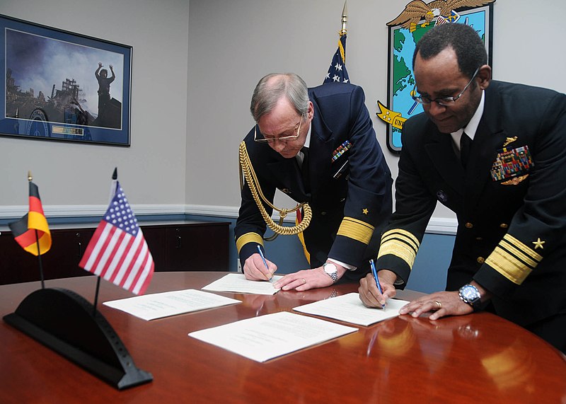 File:US Navy 100302-N-6764G-034 Rear Adm. Karl-Wilhelm Bollow, left, German defense attaché, and Vice Adm. Mel Williams Jr., commander of U.S. 2nd Fleet, sign a mutual declaration of intent regarding the German navy frigate FGS Hess.jpg