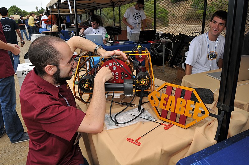 File:US Navy 110713-N-UN340-029 Noah Olsman prepares his team's autonomous underwater vehicle, SeaBee III, for a practice run.jpg