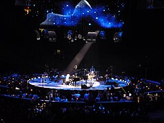 James Taylor and Carole King perform "Up on the Roof" together in 2010 during their Troubadour Reunion Tour. Up on the Roof JT CK 2010.jpg