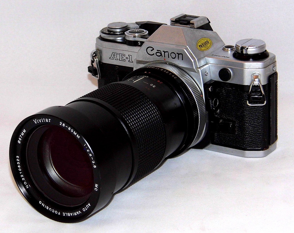 File:Vintage Canon AE-1 35mm SLR Film Camera With Vivitar 28-85mm 