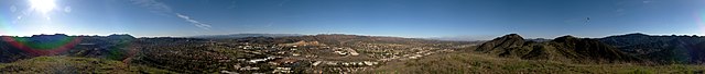 Panorama of Agoura Hills and Westlake Village with Ballard Mountain prominent as the leftmost peak in the image