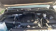 A Toyota Tundra's engine bay, showing the 3UR-FE engine