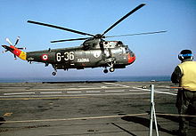 A SH-3 prepares to touch down on the Giuseppe Garibaldi. 551-sh3d-esDragon-Hammer92.jpg