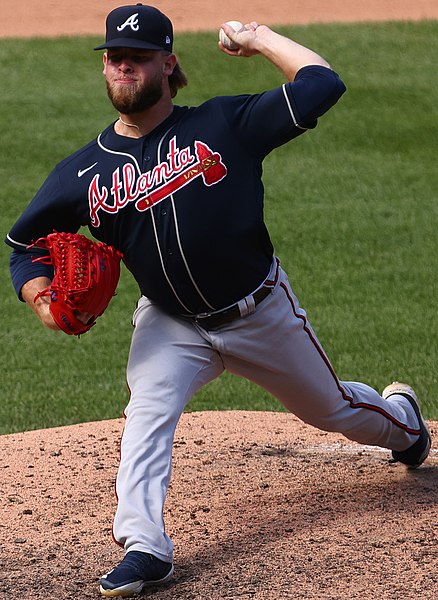 A. J. Minter, a relief pitcher for the Atlanta Braves pitching in the 9th inning of a game versus the Washington Nationals.