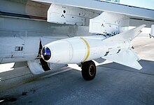 The Walleye combined a contrast seeker with a data link to the launch aircraft that allowed manual override. AGM-62 Walleye on a A-7C Corsair II of VX-5 at the White Sands Missile Range, 1 December 1978 (6413520).jpg
