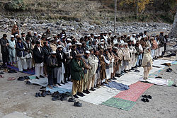 Afghans conducting their afternoon prayer in Kunar Province (December 2009) Afghan men praying in Kunar-2009.jpg