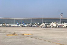 Aircraft parking at Terminal 2 international concourse