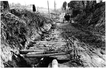 An earth road near Stafford, Va. that was repaired with pine poles about 1912.