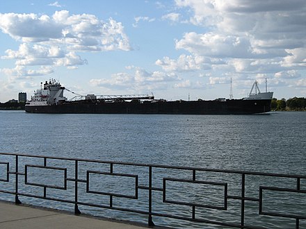The Detroit River is one of the busiest straits in the world. Lake freighter MV American Courage passing the strait.