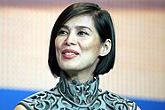 A photo of Angel Aquino wearing a turleneck top and facing to her left