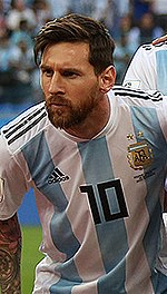 A versatile forward, Messi often plays as a classic number 10. Argentina team in St. Petersburg (cropped) Messi.jpg