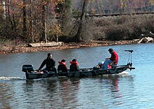 Typical aluminum bass boat with gas motor and electric trolling motor Bassboat1.jpg