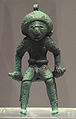 Figurine de bronce.