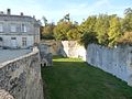 Français : Château de la Tranchade, Garat, Charente, France. Ancienne douve sèche