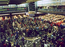 Derivatives traders in the pit at the Chicago Board of Trade in 1993 Chicago bot.jpg