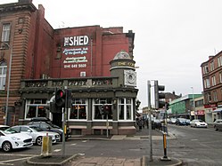 The Corona Bar stands at the location of the original village, on the junction between Langside Avenue and Pollokshaws Road. Corona Bar, Crossmyloof.jpg