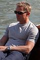 Colour photograph of Daniel Craig (in character as James Bond) sitting on yacht in 2006