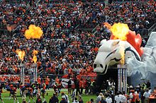 The tunnel from which Thunder emerges when he leads the Broncos onto the field is shaped like the Broncos' horsehead logo, and outside are cheerleaders, pyrotechnics and crowd noise. DenverBroncosentrance.JPG