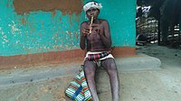 Dhurwa man playing flute.jpg