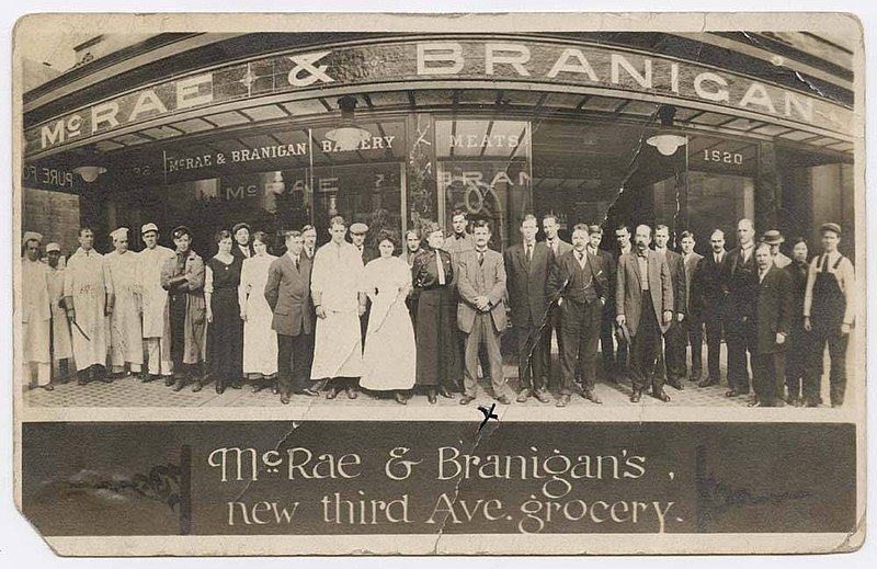 File:Employees posing outside McRae & Branigan grocery, Seattle, circa 1910 (MOHAI 11933).jpg