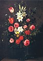 Bouquet de fleurs dans un vase en verre.