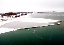 The harbor entrance to Frankfort was completely frozen over in February 1994. Frankfort Michigan frozen harbor.jpg