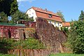 Tenement house and retaining walls