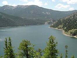 photograph of lake. And mountains