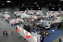 Individuals attend the International AIDS Conference that was held within Washington, D.C., in 2012 Global Village at 2012 International AIDS Conference.JPG