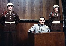 Hermann Goring under cross-examination Goering on trial (color).jpg