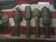 Note: the early Mk. II grenade (with baseplug) with M1 Grenade Adapter (1st from left) and Mk. IIA1 HE grenade (without baseplug) warhead on the M17 Rifle Grenade (3rd from left).