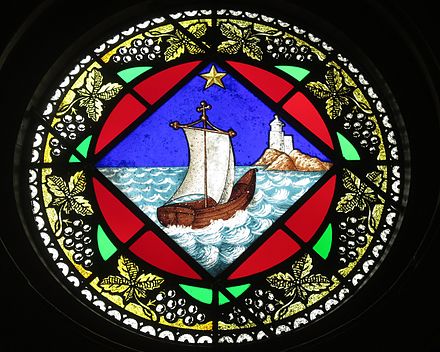 A stained glass window depicting the Barque of Saint Peter in Holy Trinity Catholic Church (Trinity, Indiana)