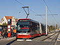 Čeština: Tramvaj Škoda 15T stanicuje v nově zrekonstruované zastávce Hradčanská během druhého dne vypravování na linku 18 a zároveň šestého dne vypravování s cestujícími, Praha English: Škoda 15T in tram stop Hradčanská, Prague