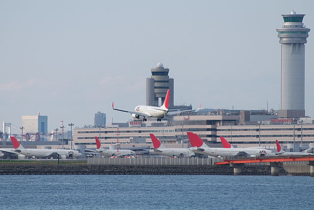 New air traffic control tower (right) and old tower (center)