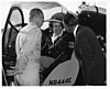 Dora Jean Dougherty Strother congratulated by Bell chief test pilot R.C. Buyers (at left) and company president E.J. Ducayet (at right) in 1961 just after breaking the helicopter altitude record (at 19,406 feet) in a Bell 47G-3