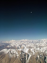 View of the Moon over Karakoram Range in Pakistan Karakoram Range.jpg