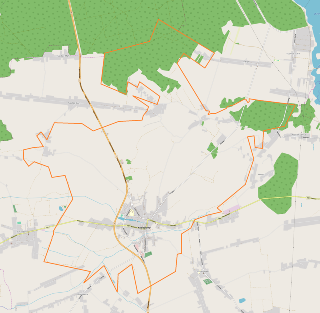 Mapa konturowa Koziegłów, blisko centrum na dole znajduje się punkt z opisem „Kościół św. Paschalisa Baylón”