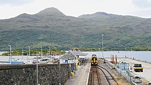 The terminus at Kyle of Lochalsh station, with the Isle of Skye in the background Kyle of Lochalsh.jpg