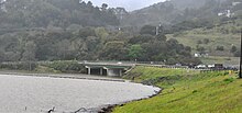 Lexington Reservoir overflows into spillway, a rare event.