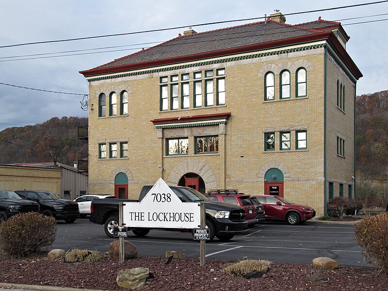 Lockhouse with sign in front that says “The Lockhouse”