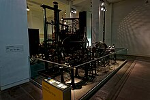 Machinery from the Block Mills presented as 'The first production line' in the Science Museum, London. London - Exhibition Road - The Science Museum 1919-28 by Sir Richard Allison - 'Making the Modern World' - 'The First Production Line'.jpg