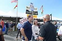 Cox and Schifanelli campaigning at the J. Millard Tawes Crab and Clam Bake with Lieutenant Governor Boyd Rutherford in October 2021. Lt. Gov Tawes Crab and Clam Bake - 51588707850.jpg