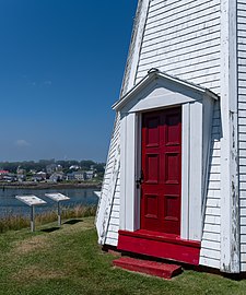 Mulholland Point Lighthouse red door, Brunswick, Canada