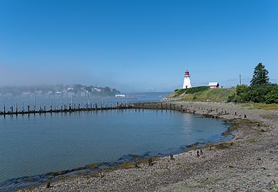 Mulholland Point Lighthouse with Lubec (US) in the background, Brunswick, Canada