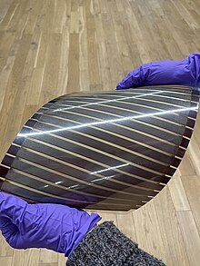 A photograph of a flexible organic solar cell produced via slot-die coating. OPV slot-die.jpg