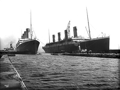 March 6, 1912: Titanic (right) had to be moved out of the drydock so her sister Olympic, which had lost a propeller, could have it replaced.