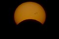 Partial Eclipse through solar filter (10657703813).jpg