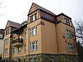 Tenement house with enclosure in open development