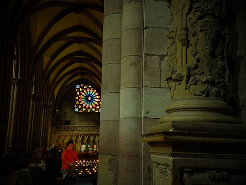 Light up a votive candle in Freiburg Cathedral